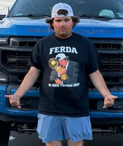 Pete the Frat wearing a Wardro fraternity shirt